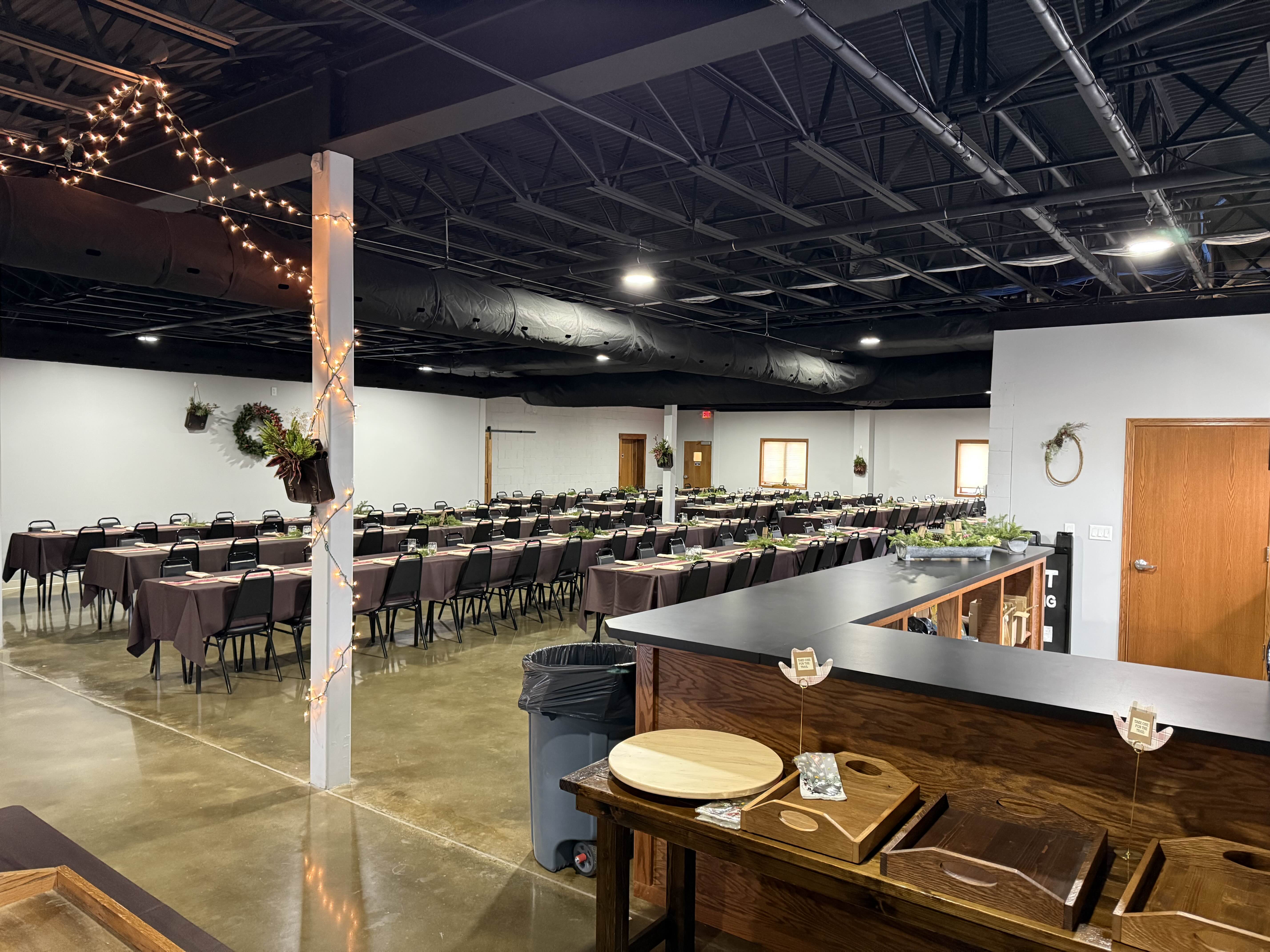 Apex Event Center with tables arranged for a community gathering