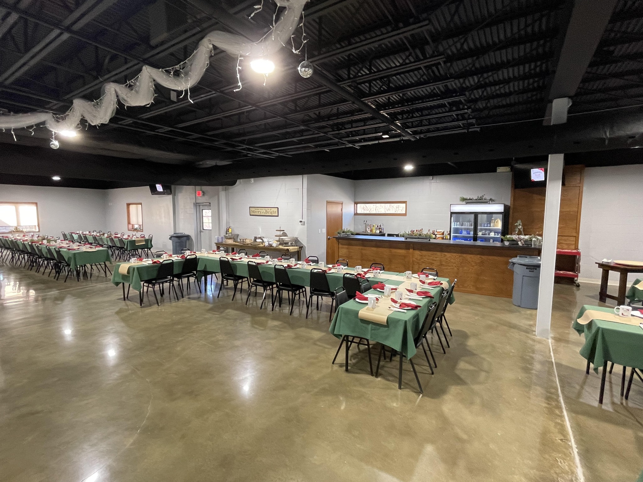 Apex Event Center spacious interior with tables set up for a large gathering